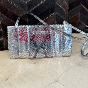 Silver michael kors clutch with strap